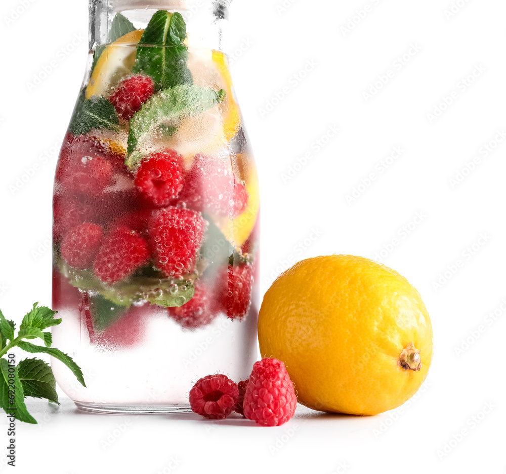 Bottle of fresh raspberry lemonade with mint on white background