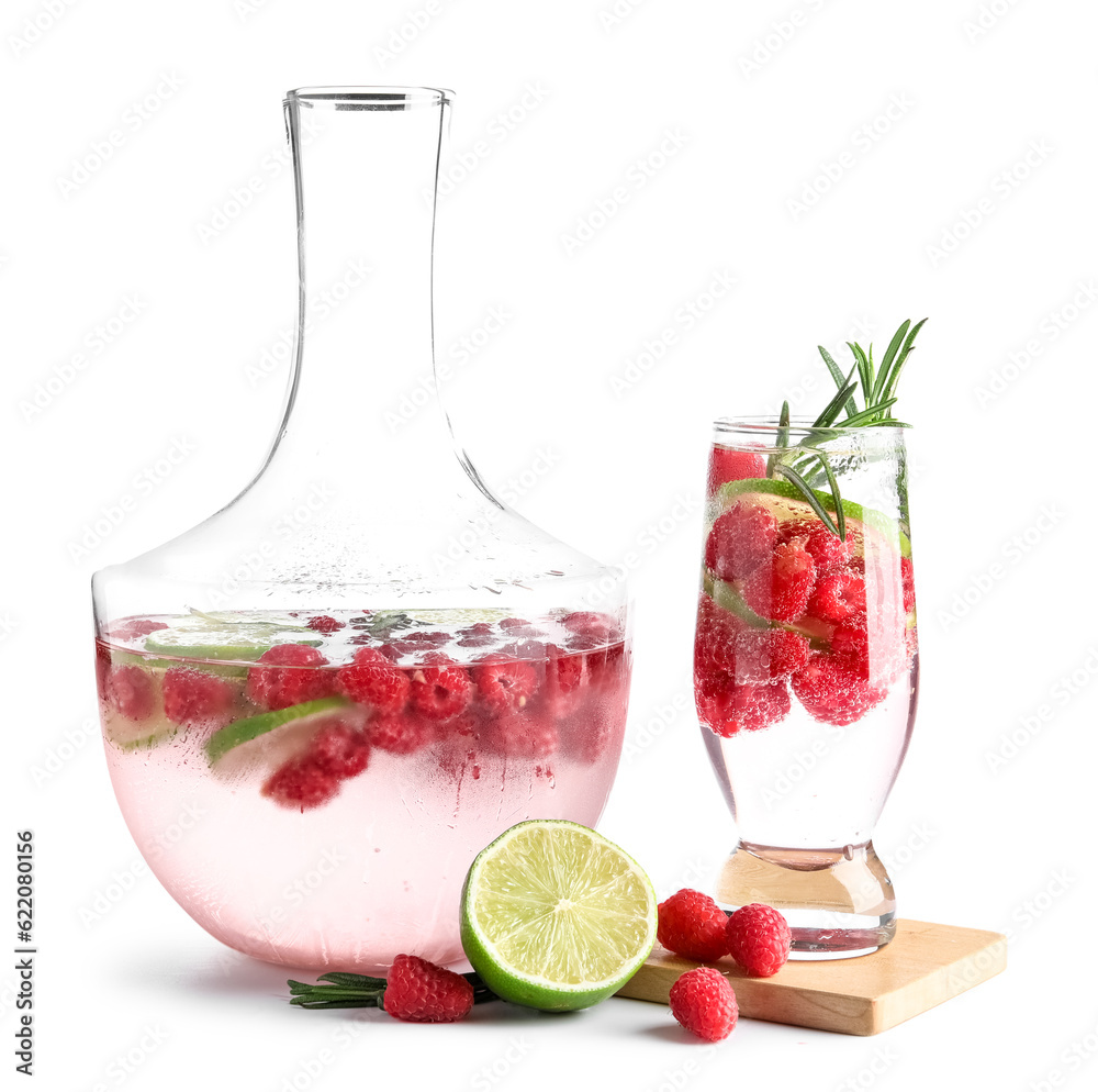 Glass and bottle of fresh raspberry lemonade with rosemary on white background