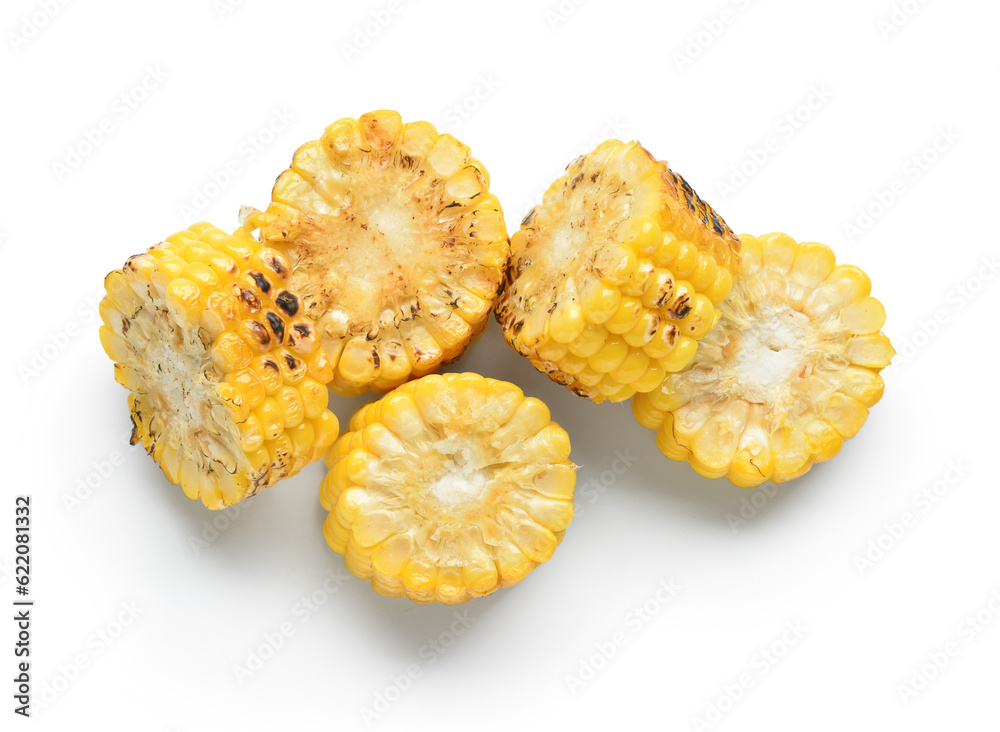 Cut tasty grilled corn cob on white background