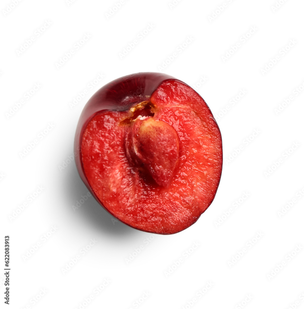 Half of red sweet cherry on white background