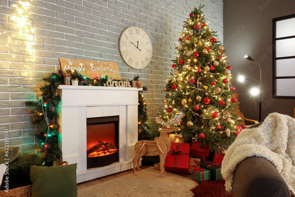 Interior of living room with fireplace, Christmas tree and gifts