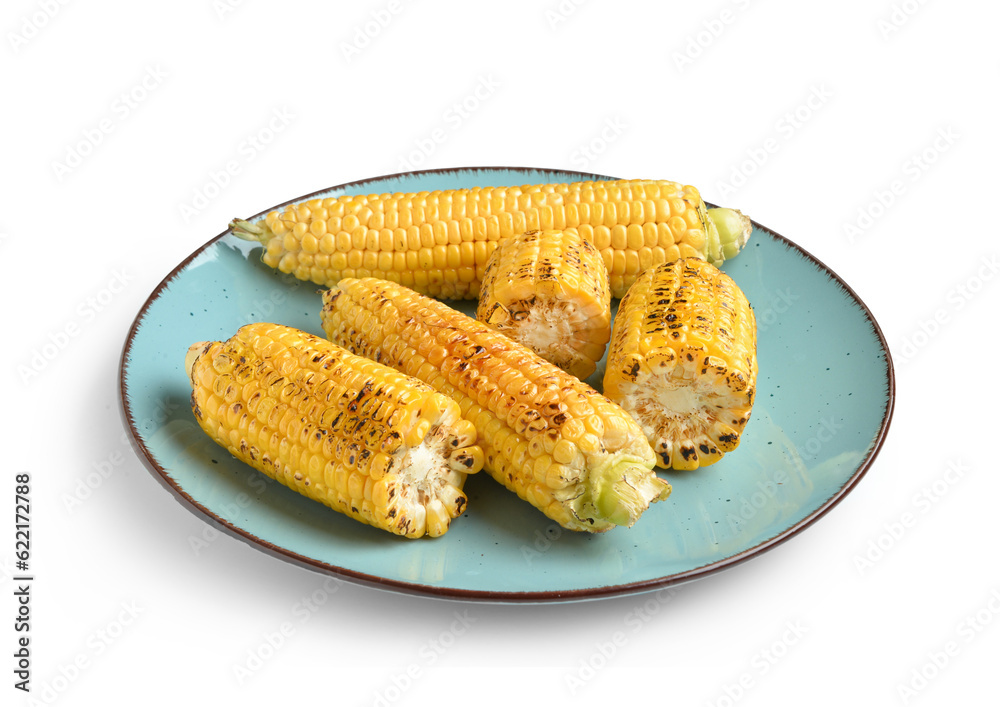 Plate with tasty grilled corn cobs on white background