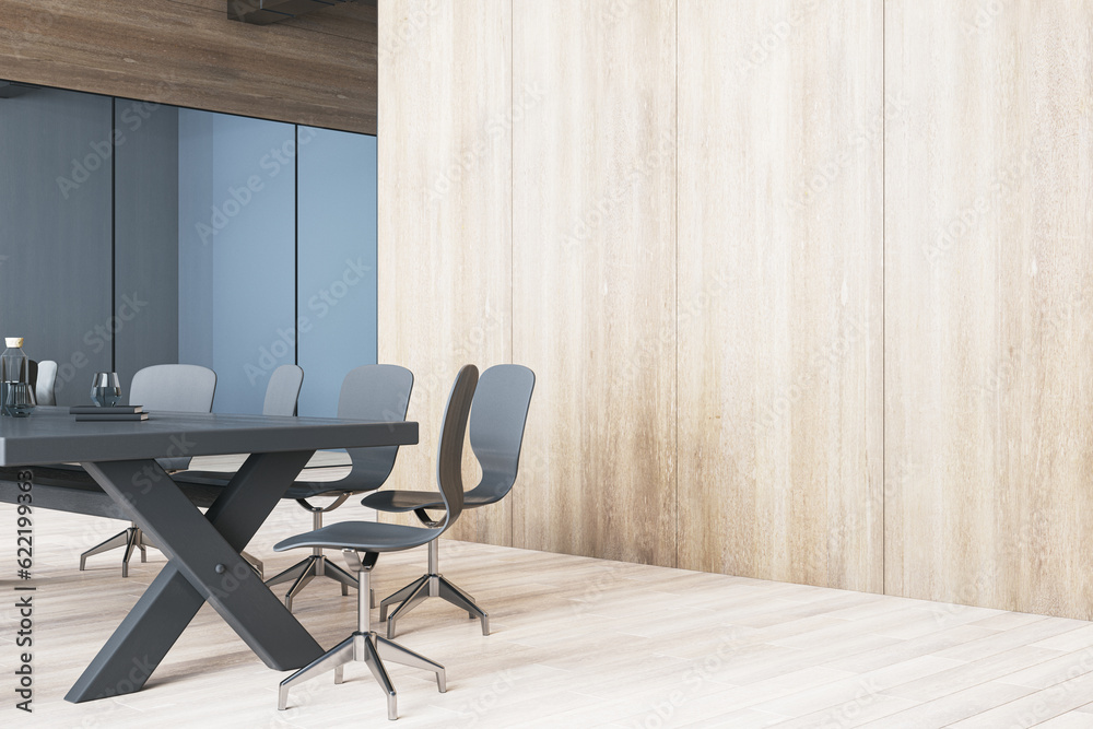 Bright contemporary meeting room interior with blank mock up place on wooden wall, table and chairs,