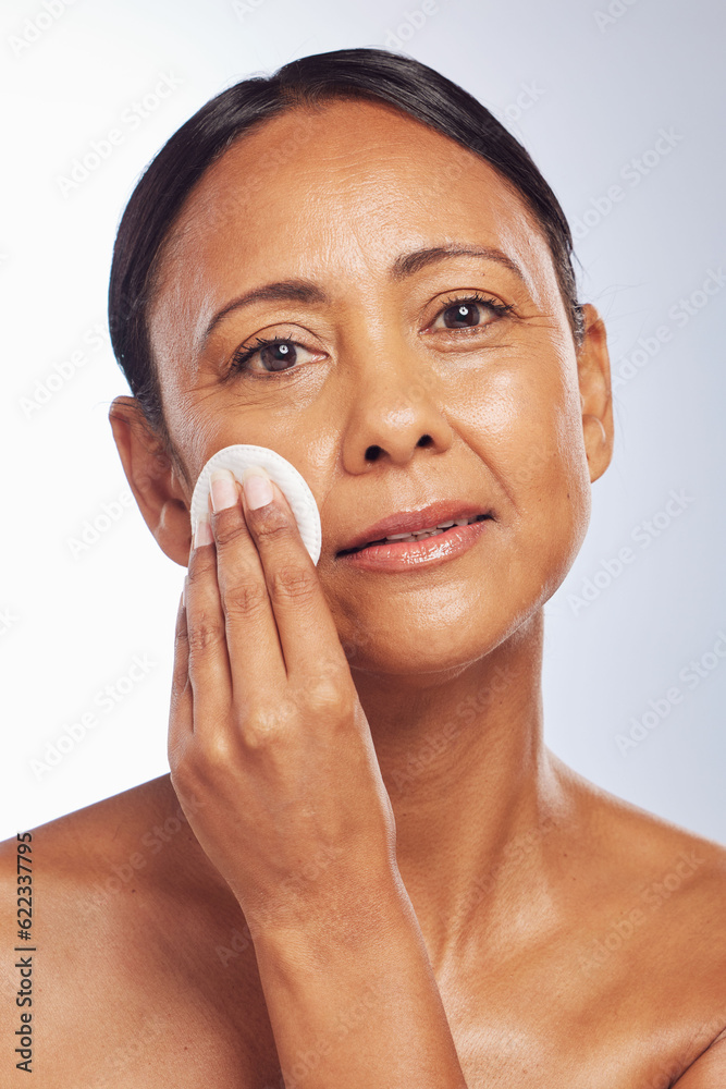 Skincare, portrait or senior woman with cotton pad for dermatology, wellness or healthy facial skin.