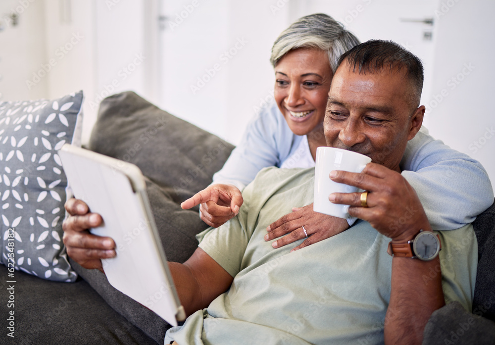 Home, tablet and happy senior couple on sofa, relax and check email, news article and point at onlin