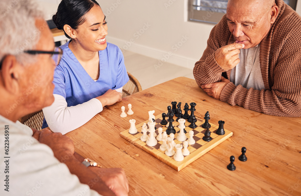 Retirement, playing and chess with senior men at nursing home for fun activity in home with nurse at