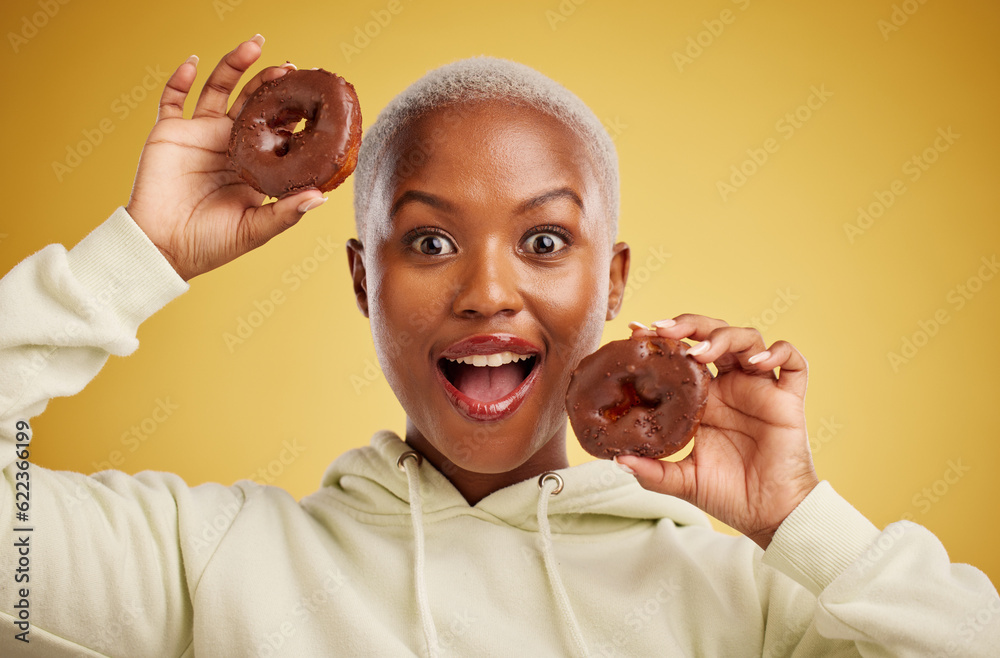 Portrait, chocolate and donut with a black woman in studio on a gold background for candy or unhealt