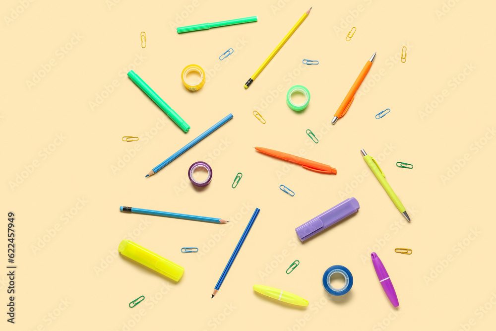 Composition with different stationery on color background