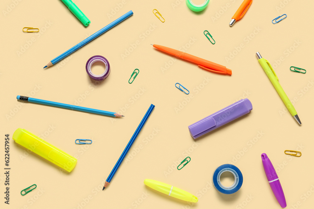 Composition with different stationery on color background