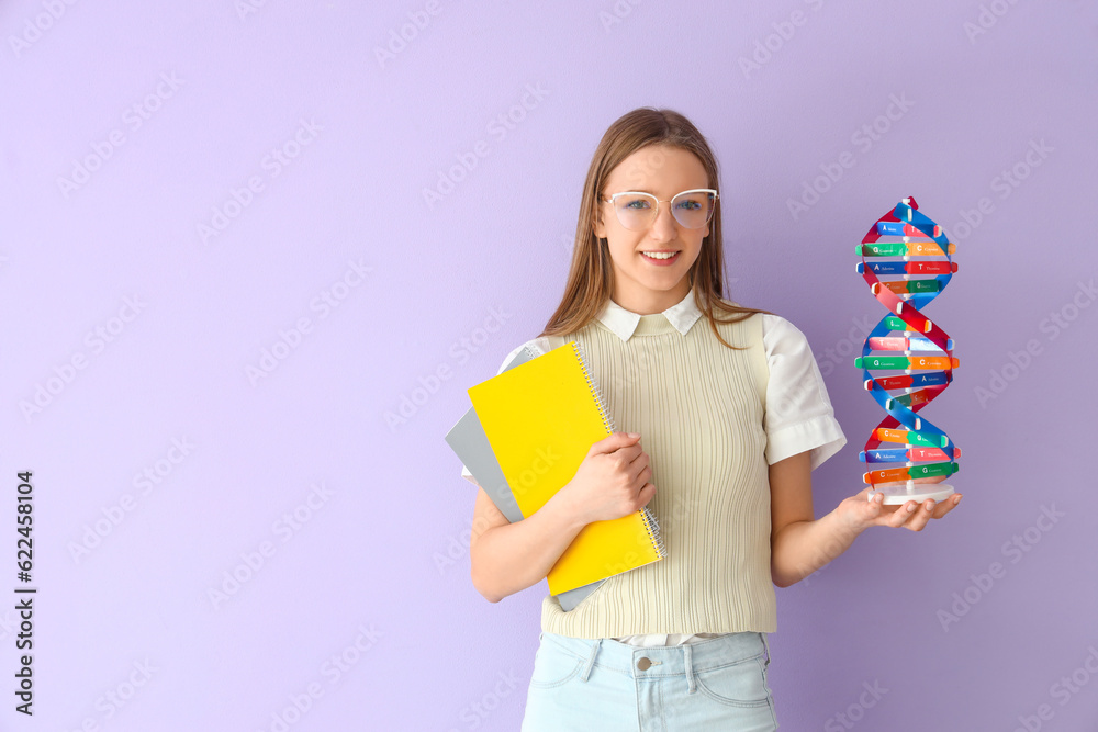 Female student with DNA model and notebooks on lilac background