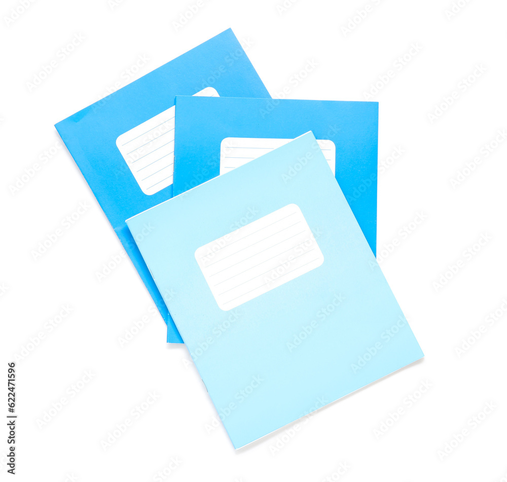 Different blue notebooks isolated on white background