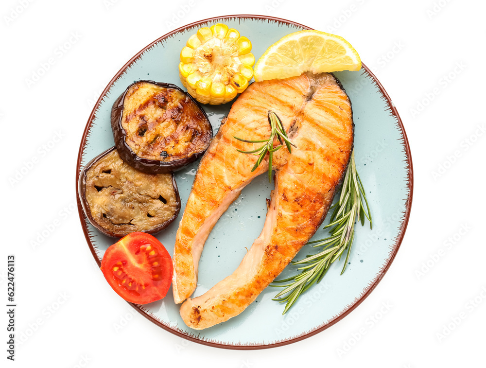 Plate with tasty grilled salmon steak and vegetables on white background