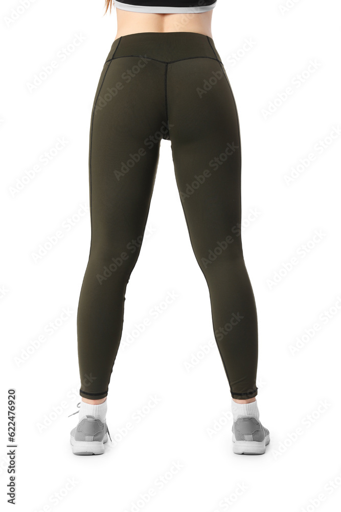 Sporty young woman in leggings on  white background, back view