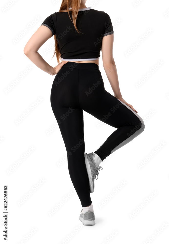 Young woman in sportswear on white background, back view