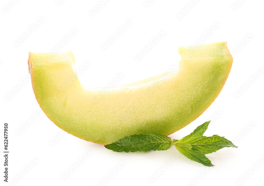 Piece of sweet melon and mint on white background