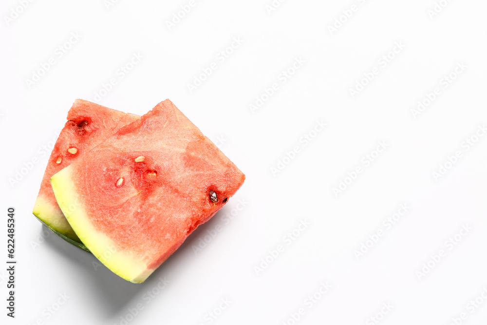 Pieces of fresh watermelon on white background