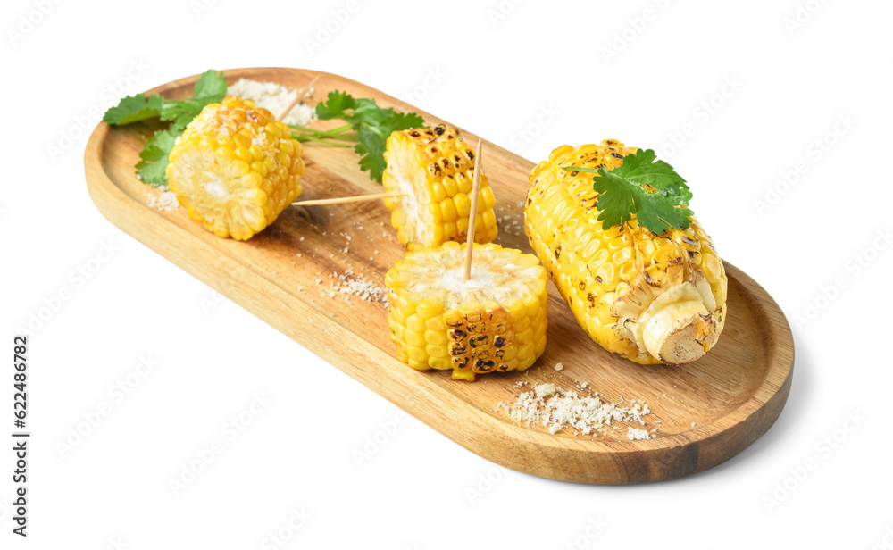 Wooden board with tasty grilled corn cobs and parsley on white background