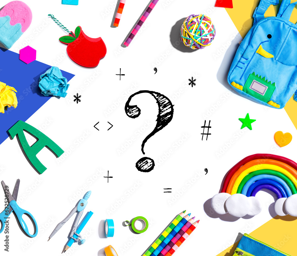 Question mark with school supplies overhead view - flat lay