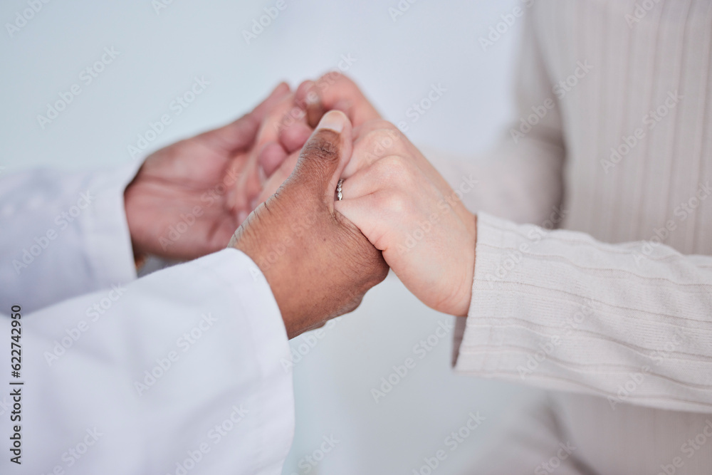 Closeup, holding hands and doctor with a patient, support or cancer with treatment, healthcare or em