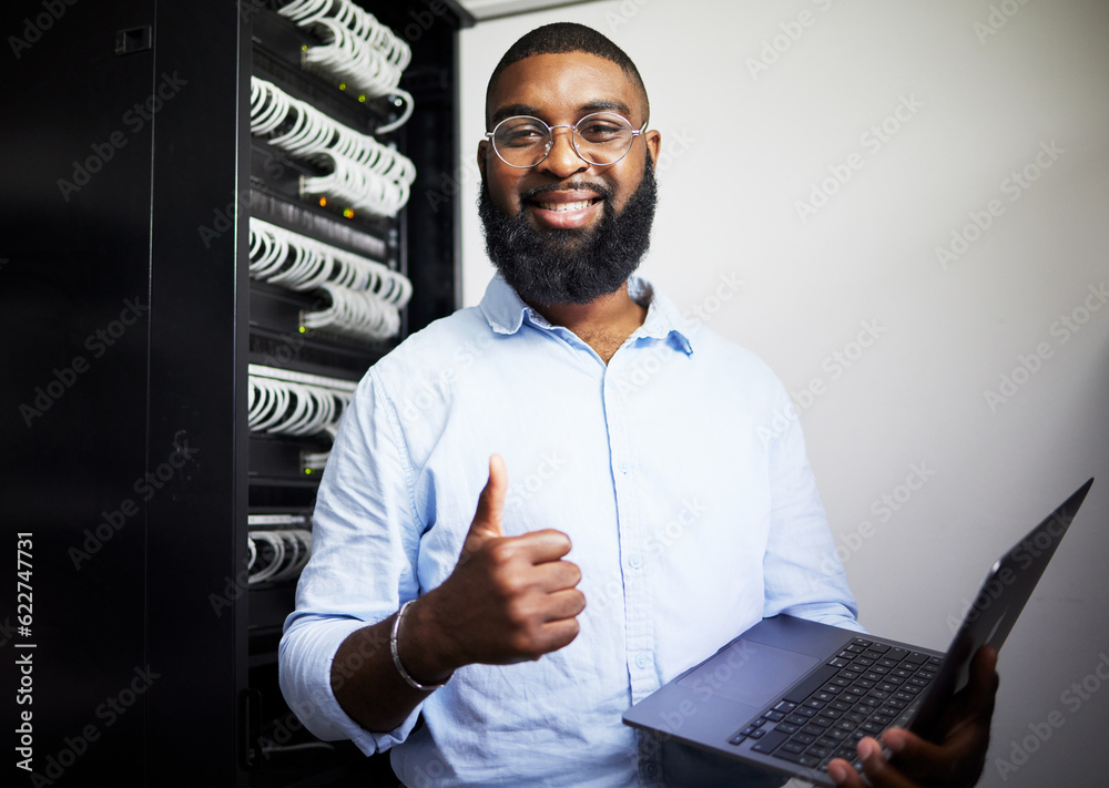 Server room, laptop and thumbs up with technician man for internet connection and software programmi