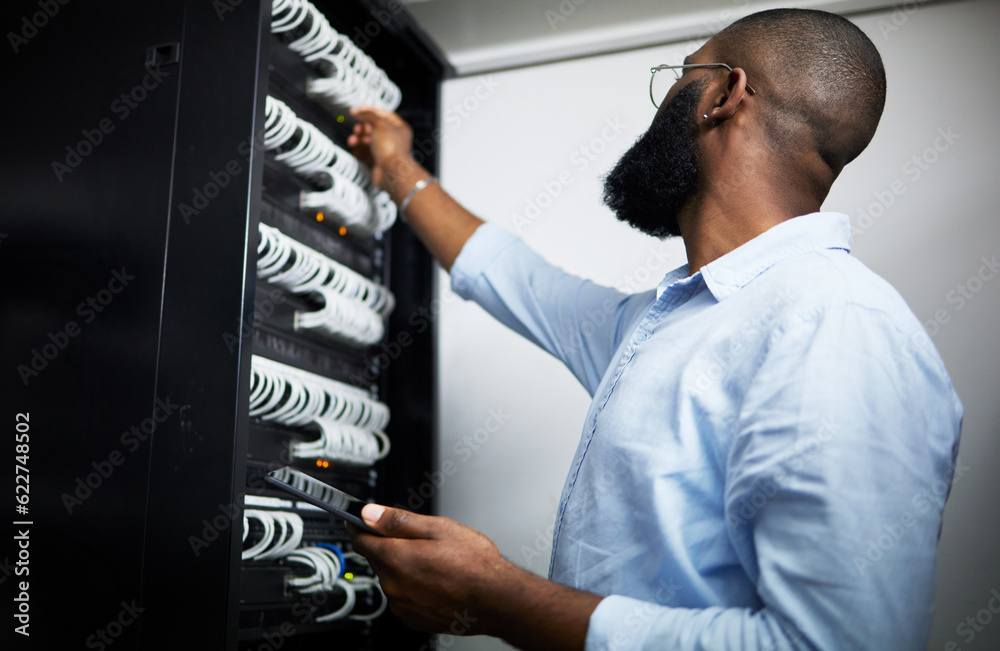 Server room, tablet and technician man with cable for internet connection for software programming. 