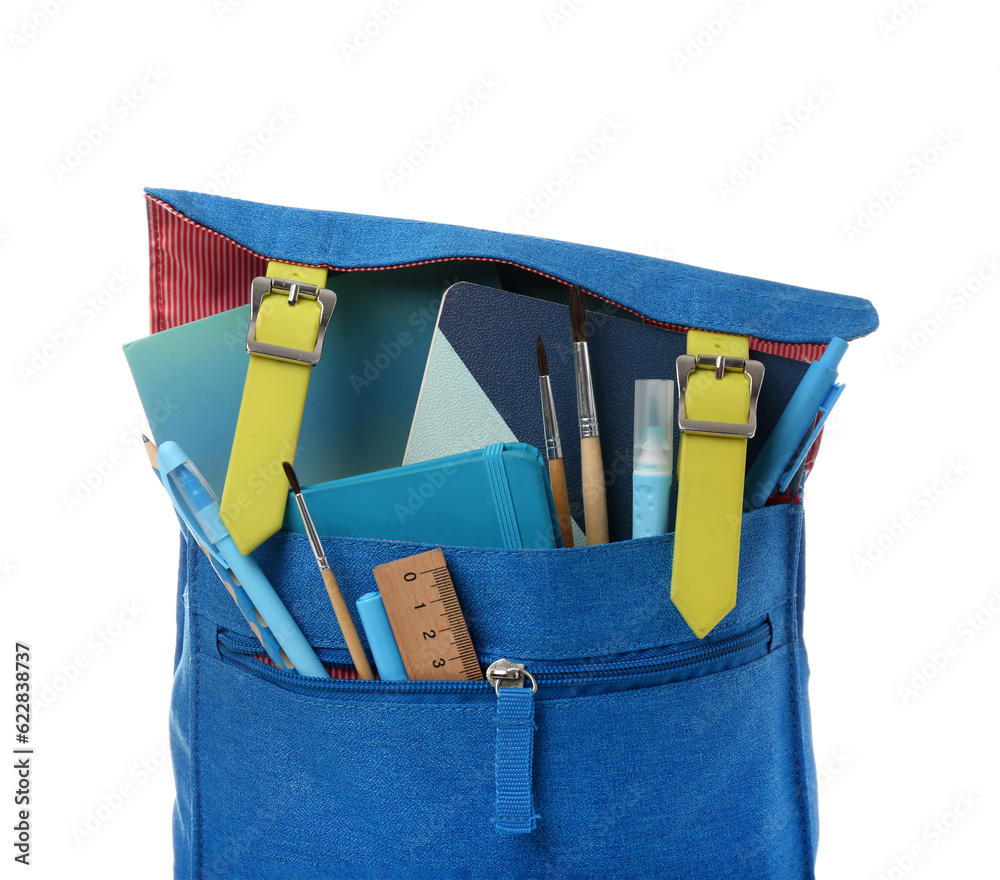 Blue school backpack with notebooks, brushes and markers on white background