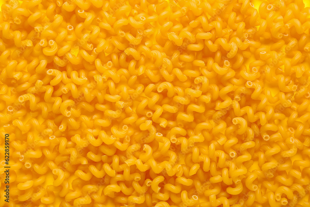 Raw cavatappi pasta as background, closeup