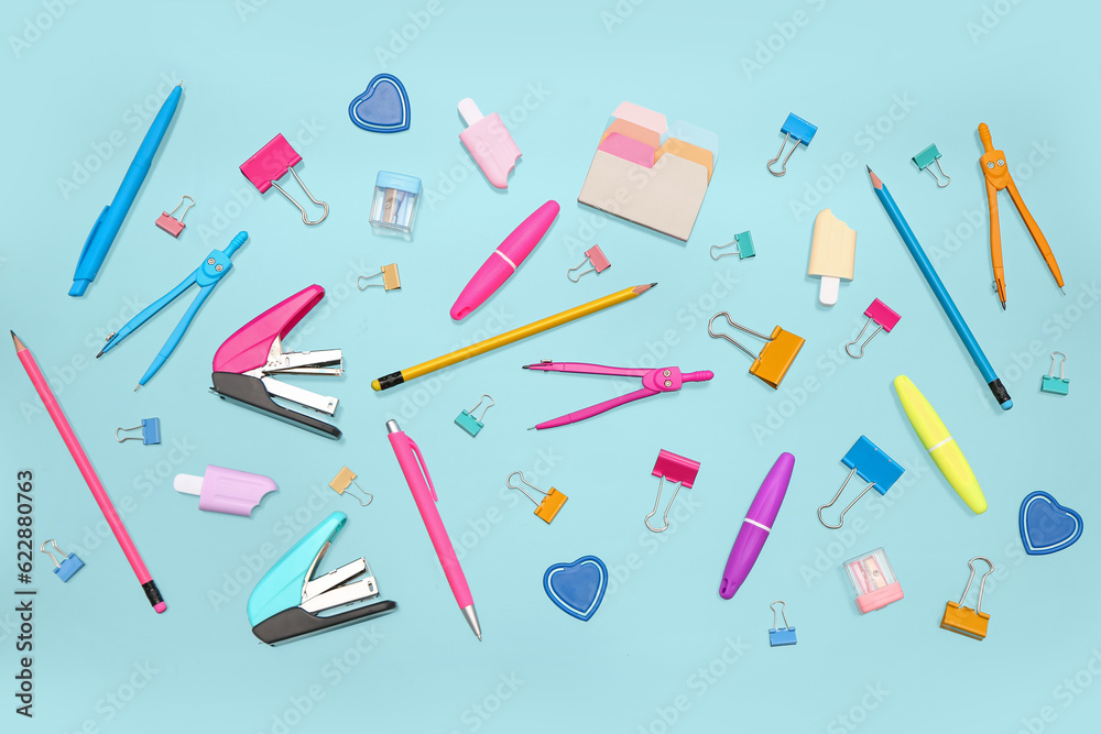 Many different stationery on blue background