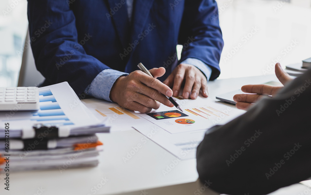 Business documents, Business people consulting meeting to discuss financial report analysis and busi