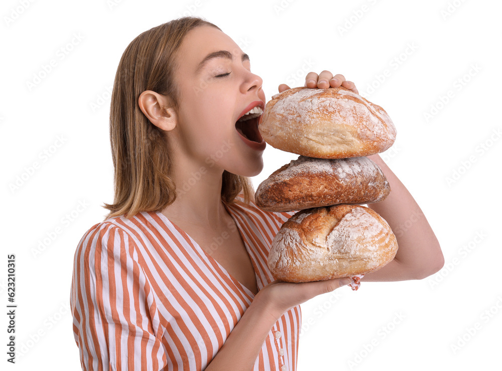 Female baker eating fresh bread on white background, closeup