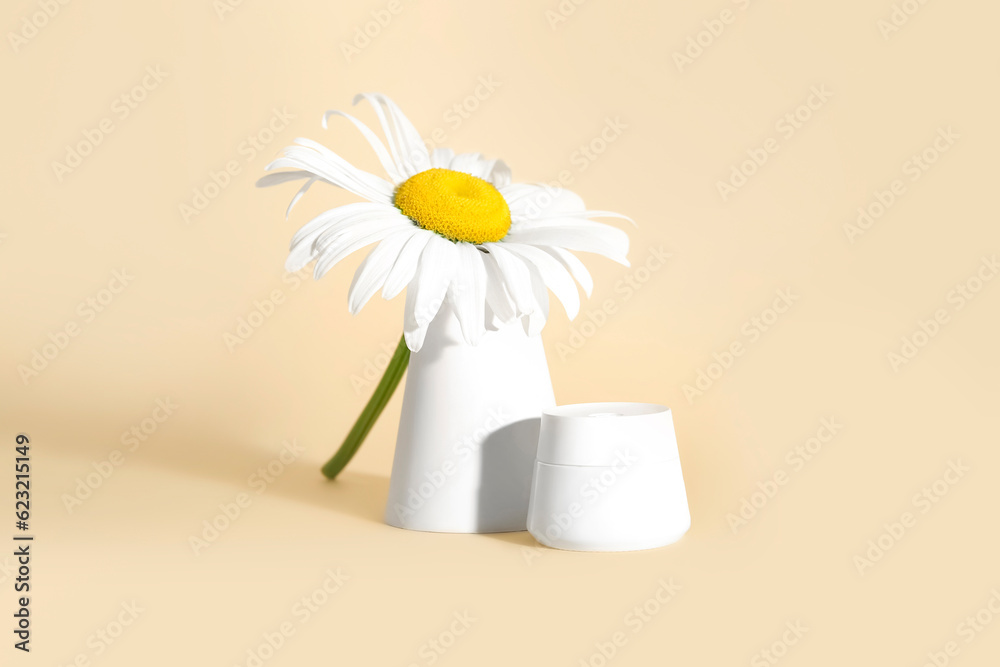 Composition with jar of cosmetic product, chamomile flower and plaster podium on color background