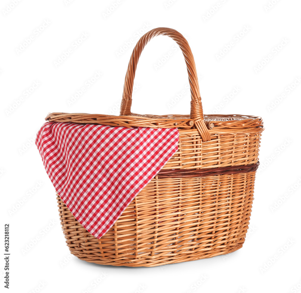 Wicker picnic basket with napkin isolated on white background