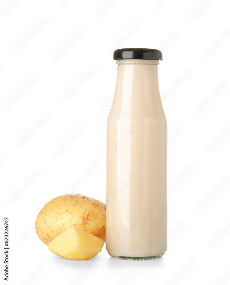 Bottle of tasty potato milk on white background