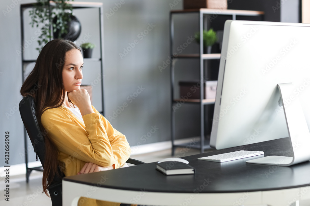 Female programmer working in office