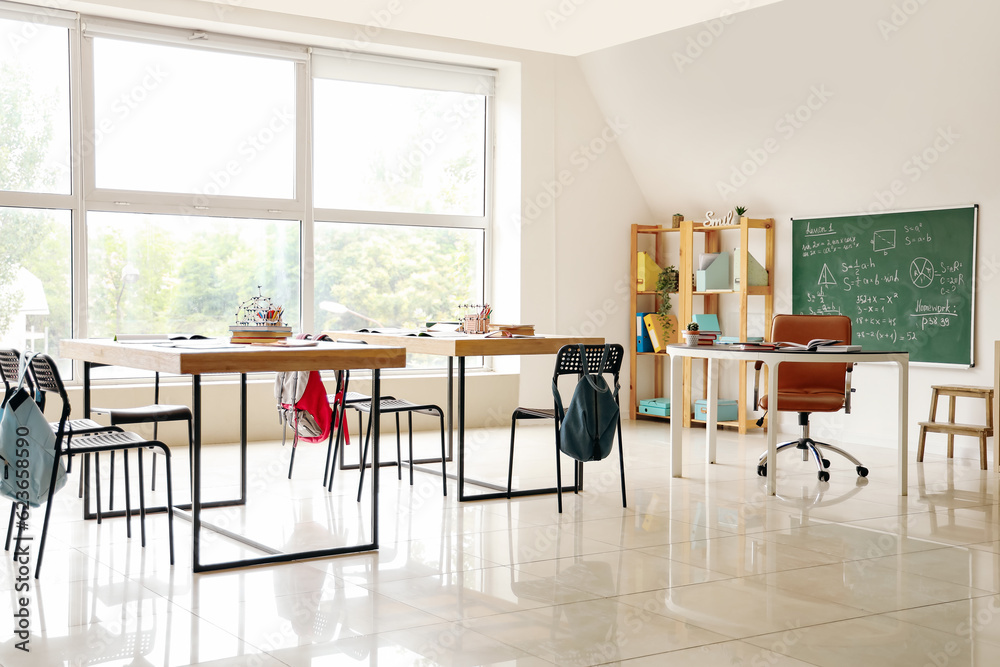 Interior of classroom with desks