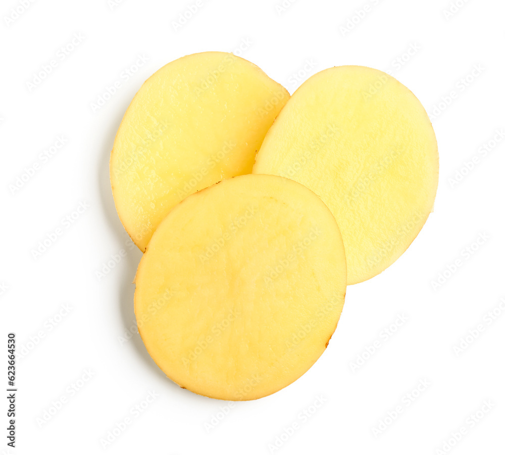 Slices of raw potato isolated on white background