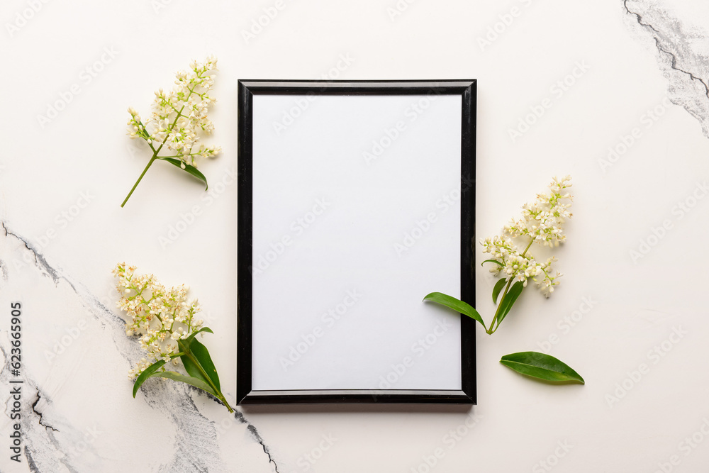 Blank photo frame and beautiful lilac flowers on white background