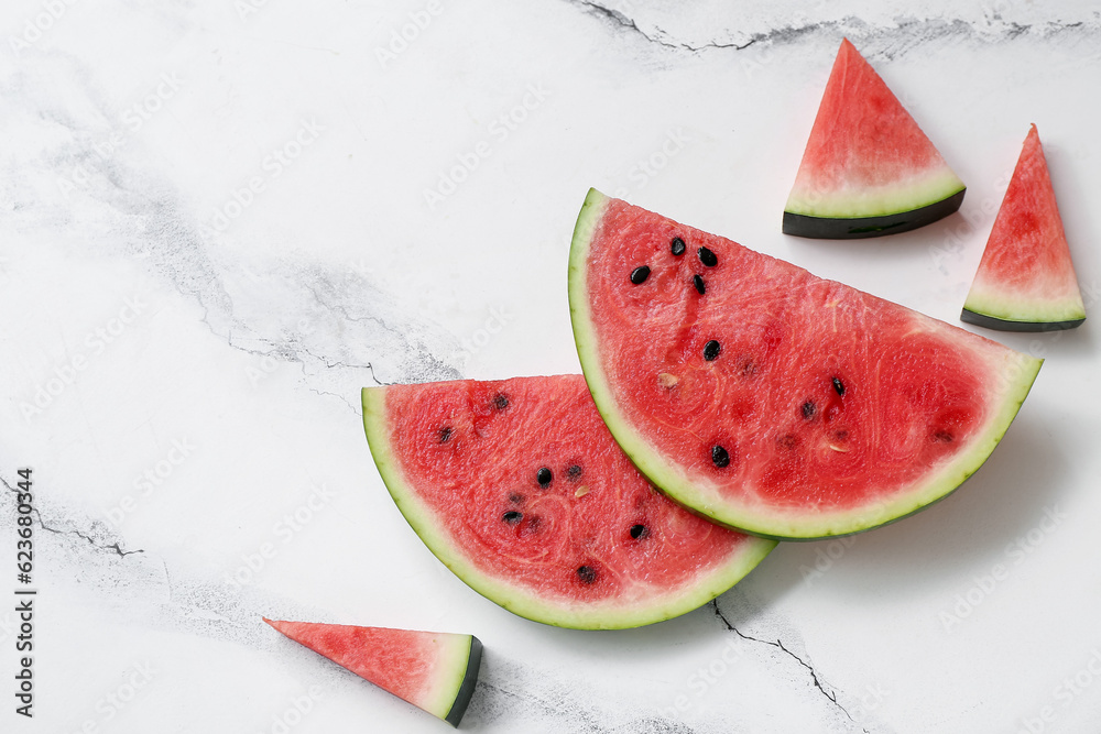 Pieces of fresh watermelon on white background