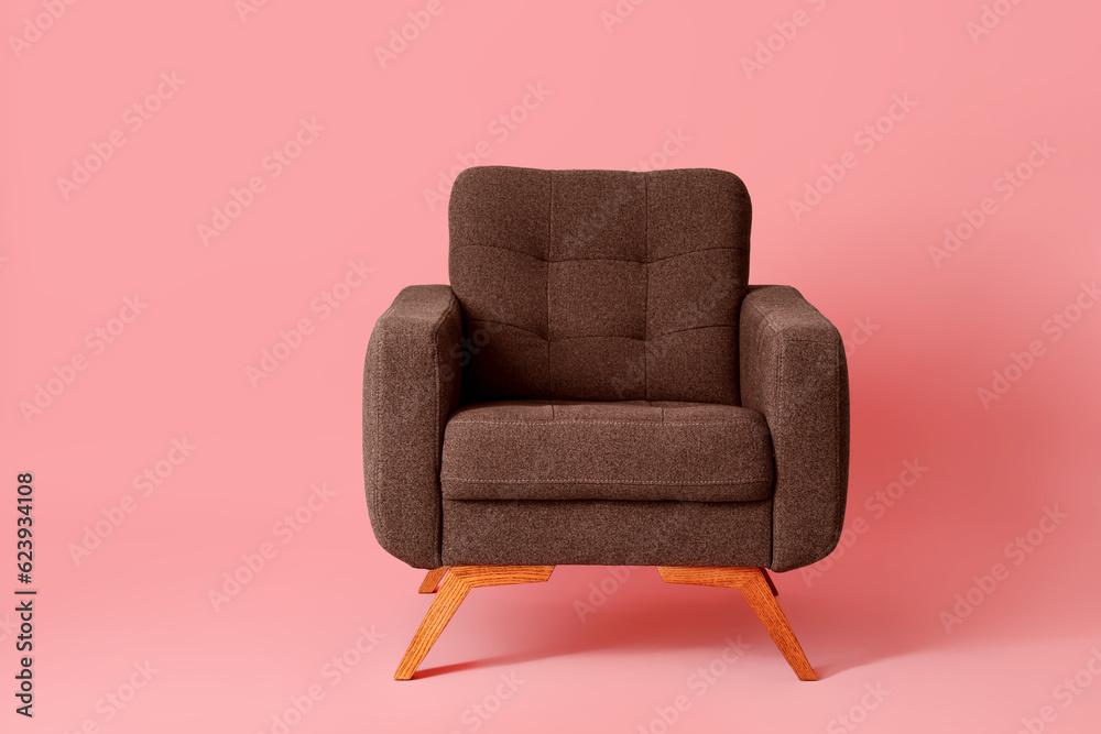 Brown armchair on pink background