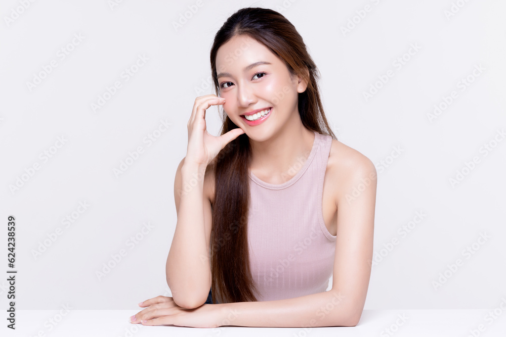 Beautiful young Asian woman with healthy and perfect skin on isolated white background. Facial and s