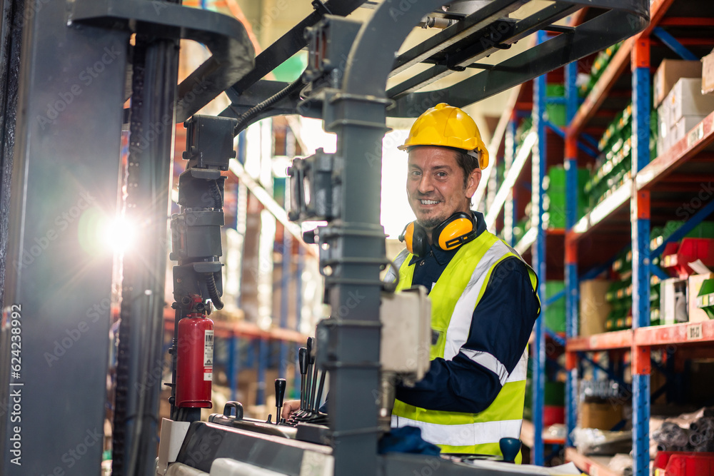 Portrait of industrial worker working in manufacturing plant together. 