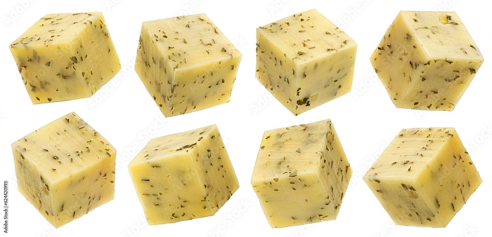 Gouda cheese cubes with herbs isolated on white background