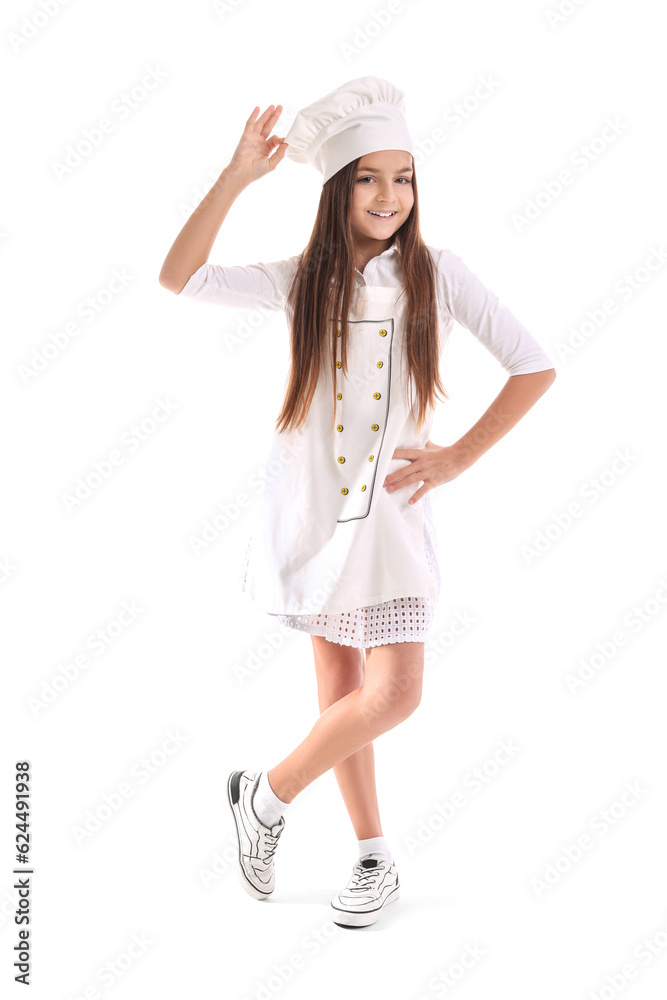 Little baker in uniform on white background