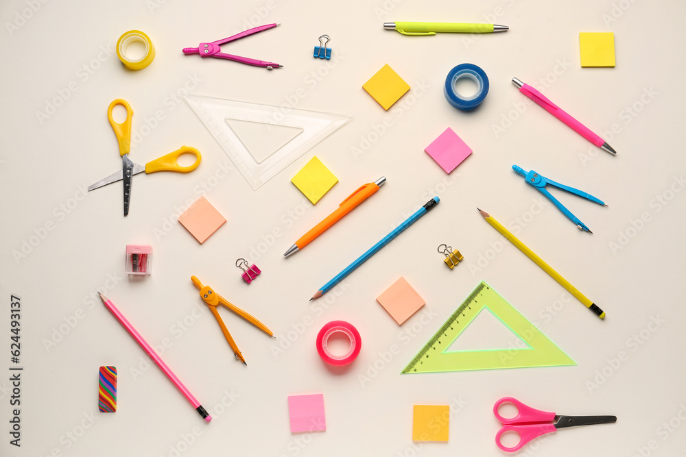 Composition with different stationery on light background