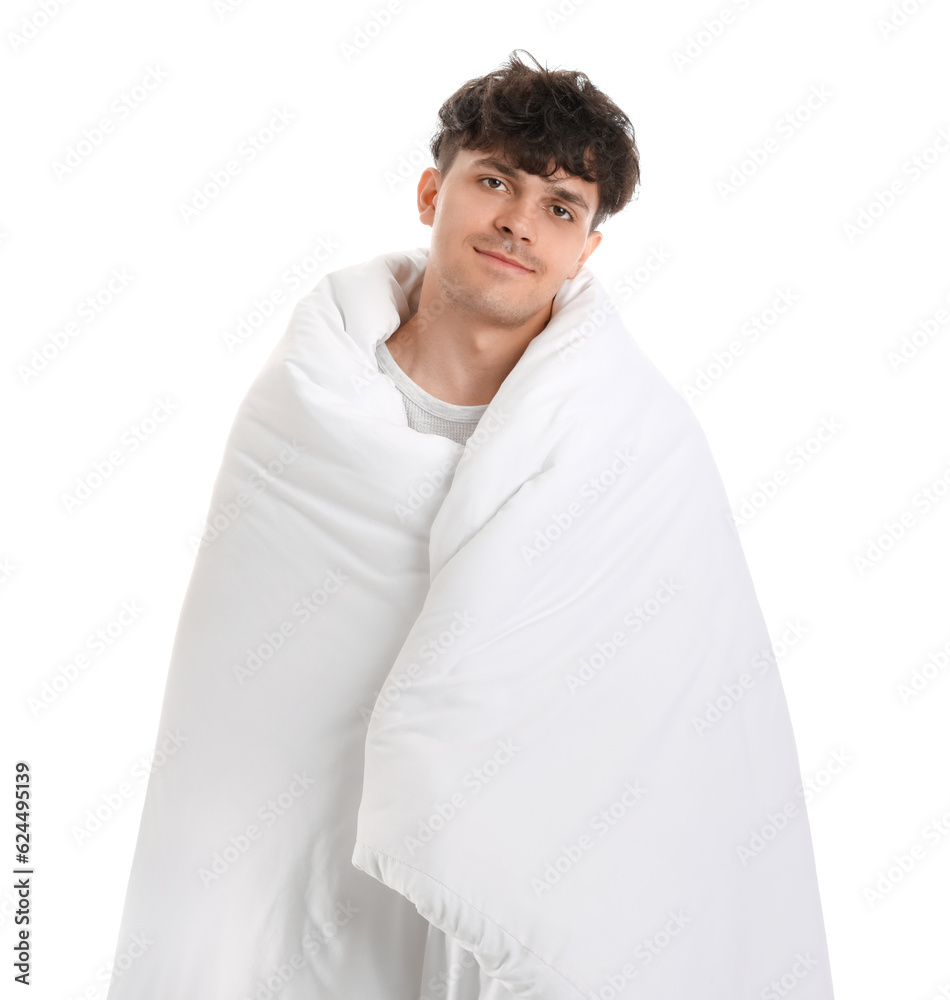 Handsome happy man with soft blanket on white background