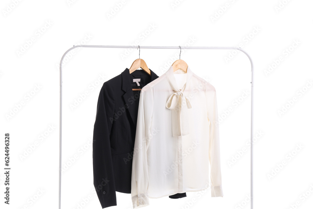 Rack with stylish classic school uniform on white background