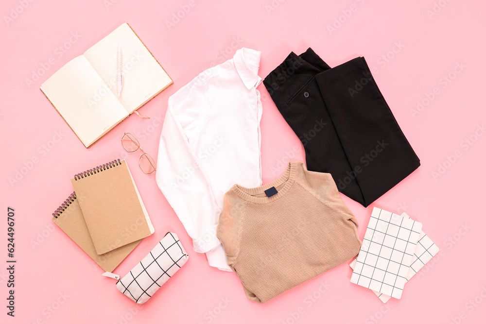 Composition with stylish school uniform, eyeglasses and notebooks on pink background