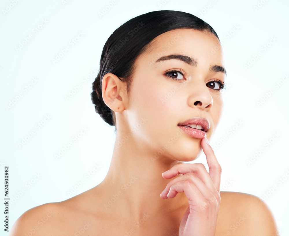 Serious face, skincare and woman in studio isolated on a white background. Portrait, natural beauty 