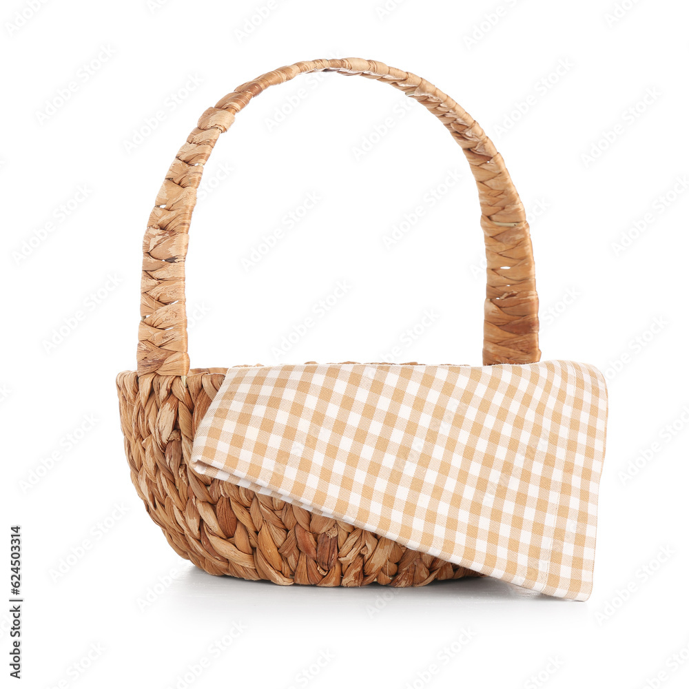 Wicker picnic basket with napkin isolated on white background