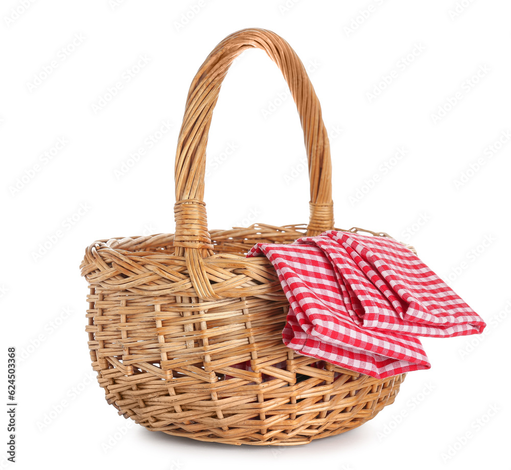 Wicker picnic basket with clean napkins on white background